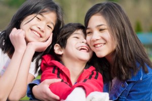 Young siblings together at a park