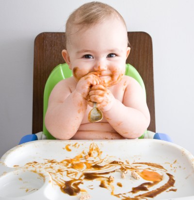 Messy eating baby
