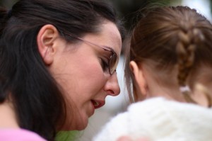 Mother talking to young child