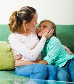 iStock_000063422155%20Mom%20comforting%20son_jpg