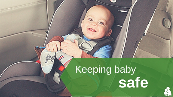 Keeping baby safe: baby smiling in car seat