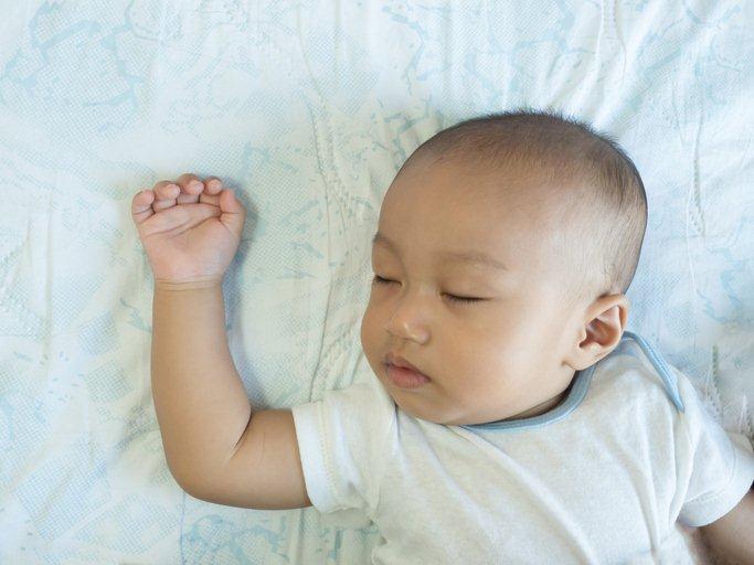 baby sleeping on back